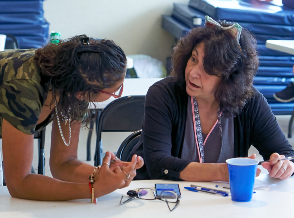 Julia interacts with clients in the S.M.I.E. program at Opportunity House